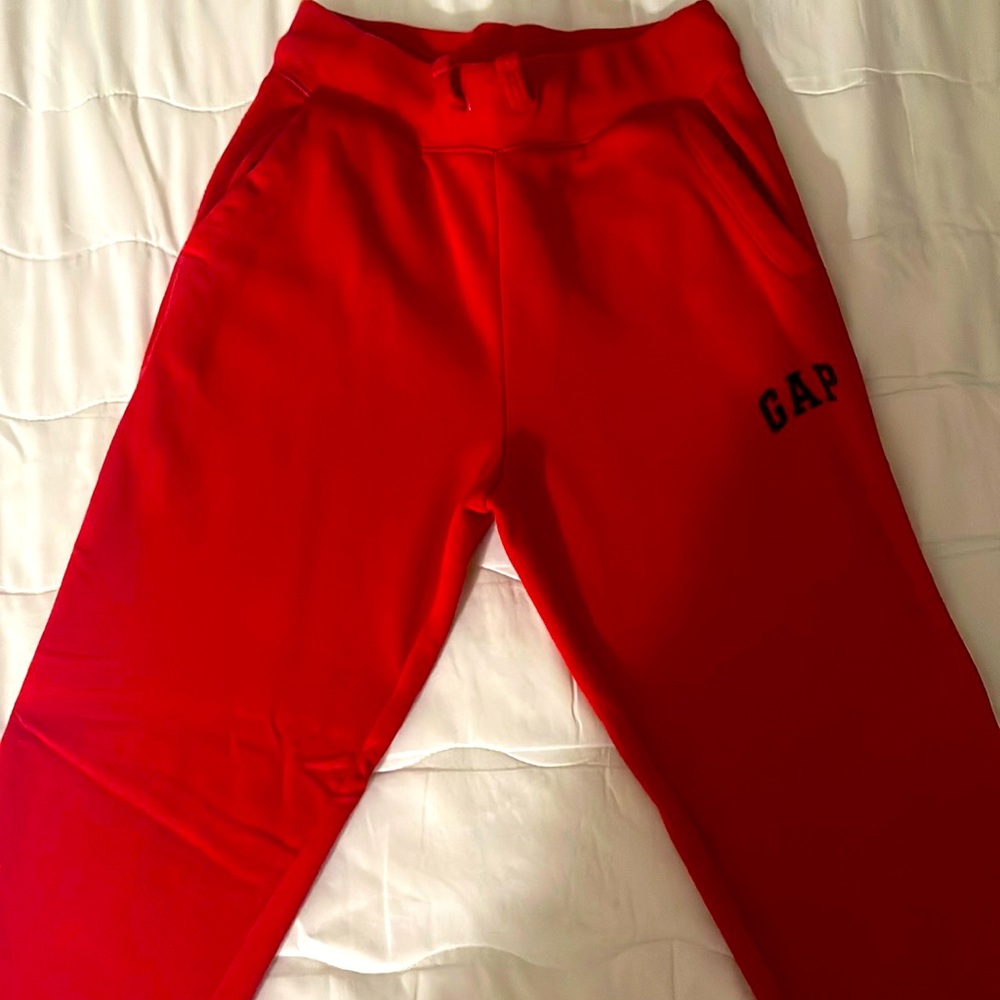 Gently used, size: L (10), red sweatpants.